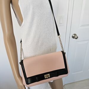 Pink and Black Crossbody Bag with Flap Closure and Chain Strap